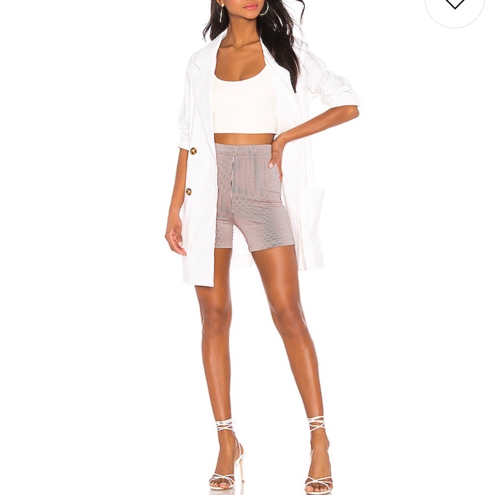 Lovers + Friends biker shorts in pink and black